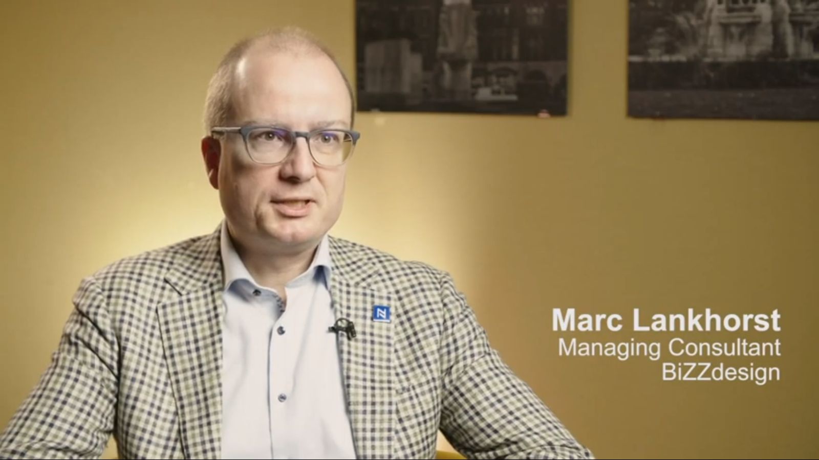 A professional management consultant — quietly representative of the operating-side work that supports debt resolution.