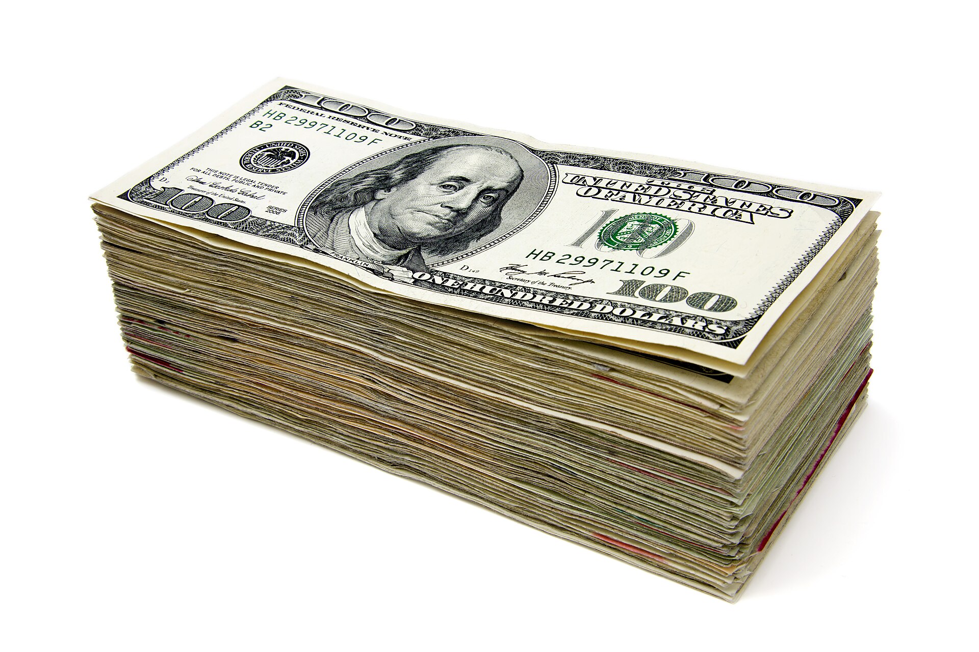 A close-up photograph of US dollar bills, fanned out — representative of cash and the principal at stake in any debt negotiation.